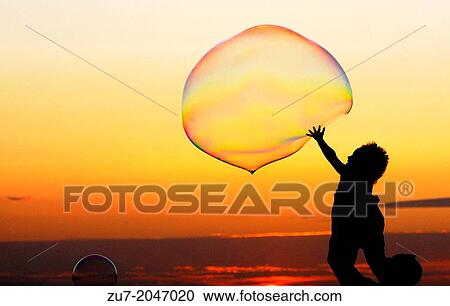 Soap bubbles in front of the sunset in Sant Antoni de Portmany, Ibiza. View Large Photo Image Stock Image - Soap bubbles in front of the sunset in Sant Antoni de Portmany, Ibiza.. Fotosearch