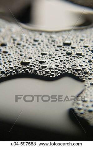 Soap suds in dishwater View Large Photo Image Stock Image - Soap suds in dishwater. Fotosearch