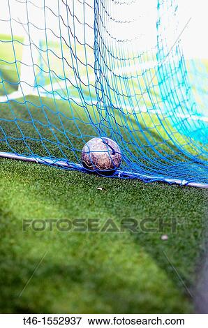 Soccer ball into a goal in soccer 11 View Large Photo Image Stock Photo - Soccer ball into a goal in soccer 11. Fotosearch