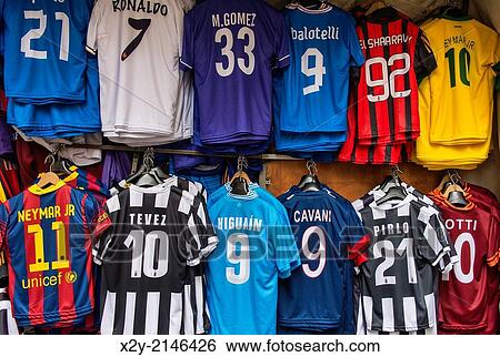 Stock Photograph - Soccer star player team futball jerseys for sale, Italy.. Fotosearch