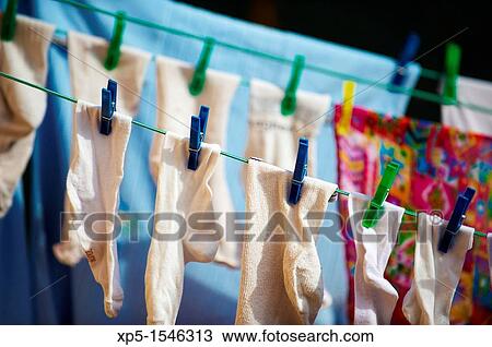 Socks drying in the sun View Large Photo Image Stock Image - Socks drying in the sun. Fotosearch