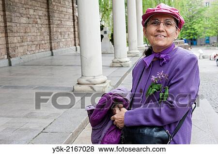 Sofia, Bulgaria. Orthodox-Christian female visitor to the Svetja Nedelya church, down town Sofia, telling about the history of this particular church building. View Large Photo Image Stock Photo - Sofia, Bulgaria. Orthodox-Christian female visitor to the Svetja Nedelya church, down town Sofia, telling about the history of this particular church building.. Fotosearch