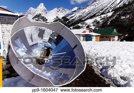 Stock Photo - Solar powered cooker used at a teahouse at Tengboche, Everest Region, Nepal. Fotosearch