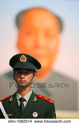 Soldier in front of the huge portrait of Chairman Mao in Tianenmen Square, Beijing View Large Photo Image Picture - Soldier in front of the huge portrait of Chairman Mao in Tianenmen Square, Beijing. Fotosearch