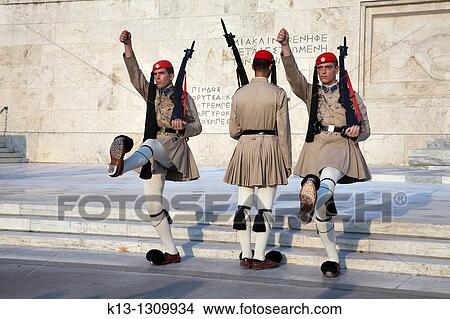 Soldiers Evzones on guard in the Monument to the Unknown Soldier and Parliament Royal Palace Syntagma Square Athens Greece View Large Photo Image Picture - Soldiers Evzones on guard in the Monument to the Unknown Soldier and Parliament Royal Palace Syntagma Square Athens Greece. Fotosearch