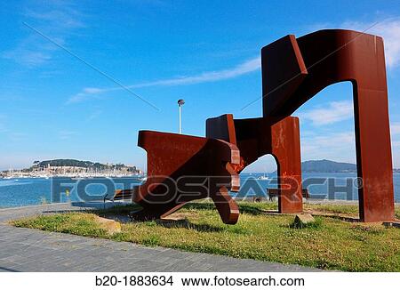 Soledad Penalta scuplture, Peninsula de Santa Marta, Monterreal castle in the background, Baiona, Pontevedra, Galicia, Spain. View Large Photo Image Picture - Soledad Penalta scuplture, Peninsula de Santa Marta, Monterreal castle in the background, Baiona, Pontevedra, Galicia, Spain.. Fotosearch
