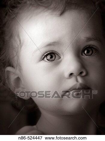 Solemn child, moody View Large Photo Image Stock Photo - Solemn child, moody. Fotosearch