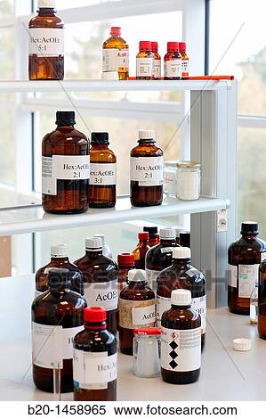 Stock Photography - Solvents to use for column chromatography, synthesis lab, IkerChem research lab, design and synthesis of new chemical entities with therapeutic applications in oncology, discovery and development of novel drugs for the treatment of cancer. Fotosearch