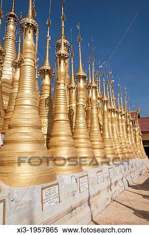 Some of the numerous golden stupas at the Shwe Indein Pagoda, Indein, Shan State, Myanmar, (Burma). View Large Photo Image Stock Photography - Some of the numerous golden stupas at the Shwe Indein Pagoda, Indein, Shan State, Myanmar, (Burma).. Fotosearch