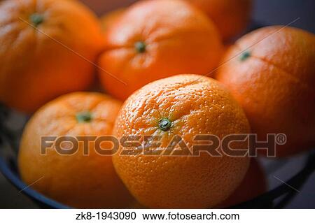 Some oranges in a bowl. View Large Photo Image Stock Image - Some oranges in a bowl.. Fotosearch