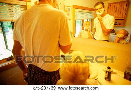 Stock Photo - Sons imitating dad shaving. Fotosearch