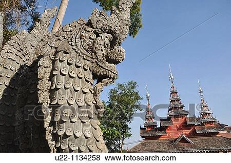 Sop Ruak (Thailand): sculpture by a Buddhist temple View Large Photo Image Stock Photo - Sop Ruak (Thailand): sculpture by a Buddhist temple. Fotosearch