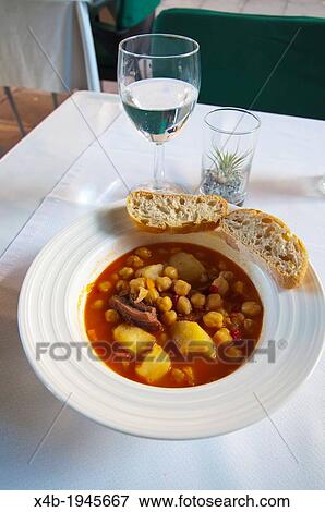 Stock Photo - Sopa de Lentejas the bean potato and meat soup Puerto de la Cruz city Tenerife island the Canary Islands Spain Europe.. Fotosearch