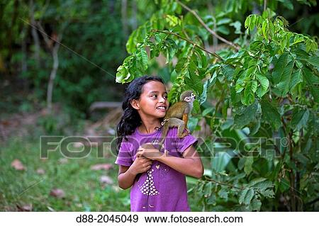 South America, Brazil, Amazonas state, Manaus, Amazon river basin, child and Common squirrel monkey (Saimiri sciureus). View Large Photo Image Stock Photo - South America, Brazil, Amazonas state, Manaus, Amazon river basin, child and Common squirrel monkey (Saimiri sciureus).. Fotosearch