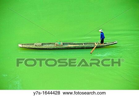 Stock Photo - South West China, Guangxi, near Guilin, chinese fisherman on Li river. Fotosearch
