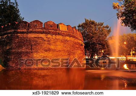 Stock Photo - Southwest or Ku Huang Corner of old city wall, Chiang Mai, Thailand. Fotosearch