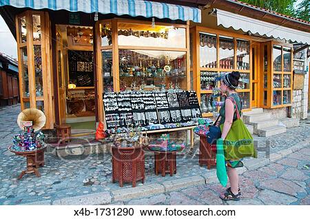 Stock Image - Souvenir shopping at Sebilj the Pigeon square BaUcarUija the Turkish Quarter central Sarajevo city Bosnia and Herzegovina Europe. Fotosearch
