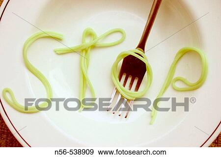 Spaghetti word (? Stop? ) View Large Photo Image Stock Photo - Spaghetti word (? Stop? ). Fotosearch