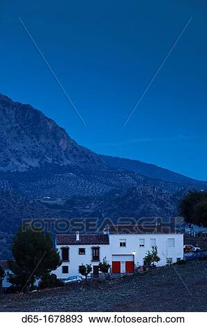 Spain, Andalucia Region, Cadiz Province, Zahara de la Sierra, house, dusk View Large Photo Image Stock Image - Spain, Andalucia Region, Cadiz Province, Zahara de la Sierra, house, dusk. Fotosearch