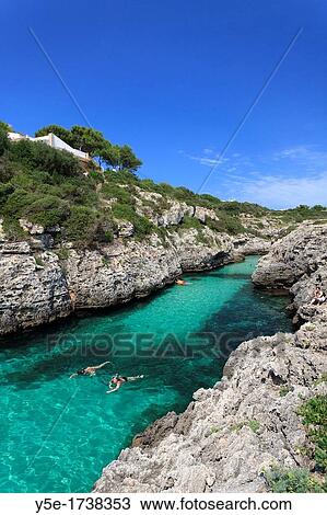 Spain, Balearic Islands, Cala en Brut beach View Large Photo Image Stock Image - Spain, Balearic Islands, Cala en Brut beach. Fotosearch