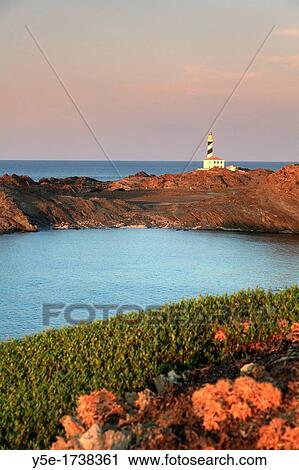 Spain, Balearic Islands, Menorca, Cap de Favaritx Lighthouse View Large Photo Image Stock Image - Spain, Balearic Islands, Menorca, Cap de Favaritx Lighthouse. Fotosearch