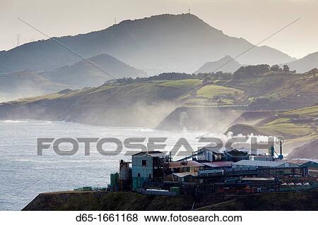 Stock Photo - Spain, Basque Country Region, Vizcaya Province, Bilbao-area, Miono, view of the Rio de Bilbao estuary and factory at the start of the Cantabrian coast. Fotosearch