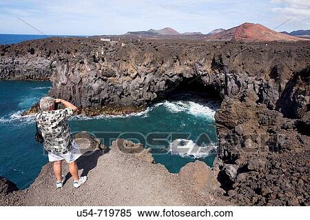 Spain, Canary Islands, Lanzarote, El Golfo, Los Hervideros. View Large Photo Image Stock Photography - Spain, Canary Islands, Lanzarote, El Golfo, Los Hervideros.. Fotosearch