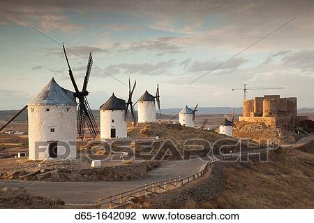 Spain, Castile-La Mancha Region, Toledo Province, La Mancha Area, Consuegra, antique La Mancha windmills, late afternoon View Large Photo Image Stock Image - Spain, Castile-La Mancha Region, Toledo Province, La Mancha Area, Consuegra, antique La Mancha windmills, late afternoon. Fotosearch