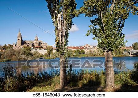 Spain, Castilla y Leon Region, Salamanca Province, Salamanca, Salamanca Cathedrals and town, viewed from the Tormes River View Large Photo Image Stock Photo - Spain, Castilla y Leon Region, Salamanca Province, Salamanca, Salamanca Cathedrals and town, viewed from the Tormes River. Fotosearch
