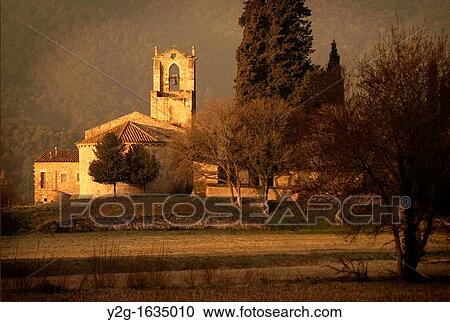 Stock Image - Spain, Catalonia, Girona, Porqueres, Banyoles, lake, church, Santa Maria de Porqueres, Saint Mary, romanesque, XII century. Fotosearch