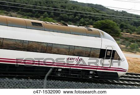Spain, Catalonia, Lleida province, High Speed Train, AVE Alvia Serie 120 entering the Vinaixa viaduct View Large Photo Image Stock Image - Spain, Catalonia, Lleida province, High Speed Train, AVE Alvia Serie 120 entering the Vinaixa viaduct. Fotosearch