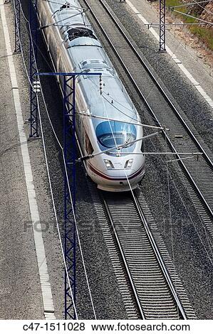 Spain, Catalonia, Lleida province, High Speed train, AVE Series 103 taken near Vinaixa viaduct View Large Photo Image Stock Photo - Spain, Catalonia, Lleida province, High Speed train, AVE Series 103 taken near Vinaixa viaduct. Fotosearch