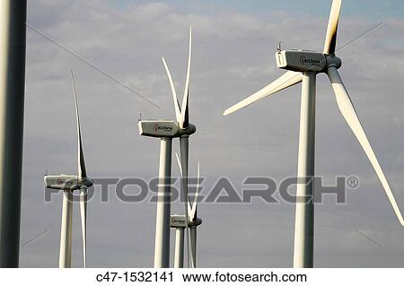 Stock Image - Spain, Catalonia, Lleida province, Tarres, Windmills at the Pla del Cintet. Fotosearch