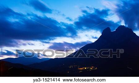 Picture - Spain, Catalonia, Pyrenees, Pedraforca Saldes in the shadow of the Pedraforca Mountain in the heart of the Cad? -Moixer? Natural Park. Fotosearch