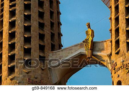 Spain, Catalunia Catalunya, Barcelona, Temple Expiatori de la Sagrada Familia, Sculpture of the risen Christ on Passion Facade View Large Photo Image Stock Photo - Spain, Catalunia Catalunya, Barcelona, Temple Expiatori de la Sagrada Familia, Sculpture of the risen Christ on Passion Facade. Fotosearch
