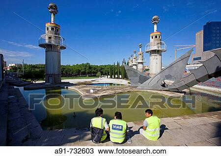 Spain, Catalunya, Barcelona, Parc de l? Espanya Industrial (Architect: Luis Pea Ganchegui), three workers taking a break View Large Photo Image Stock Image - Spain, Catalunya, Barcelona, Parc de l? Espanya Industrial (Architect: Luis Pea Ganchegui), three workers taking a break. Fotosearch
