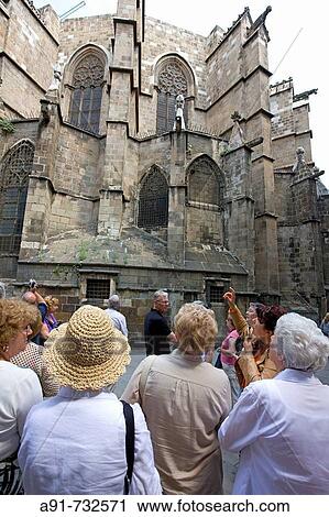 Spain, Catalunya, Barcelona, the gothic quarter (Barri Gotic), tourists looking at the Cathedral View Large Photo Image Stock Image - Spain, Catalunya, Barcelona, the gothic quarter (Barri Gotic), tourists looking at the Cathedral. Fotosearch