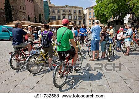 Spain, Catalunya, Barcelona, the gothic quarter (Barri Gotic), tourists on bicycles View Large Photo Image Stock Photo - Spain, Catalunya, Barcelona, the gothic quarter (Barri Gotic), tourists on bicycles. Fotosearch