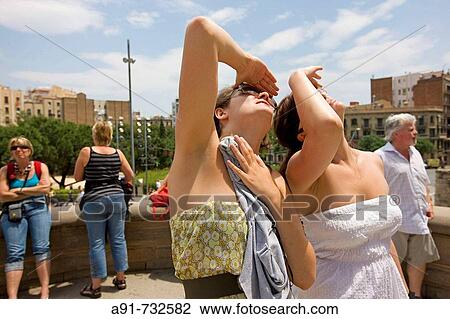 Spain, Catalunya, Barcelona, tourists looking at the Sagrada Familia church View Large Photo Image Stock Image - Spain, Catalunya, Barcelona, tourists looking at the Sagrada Familia church. Fotosearch