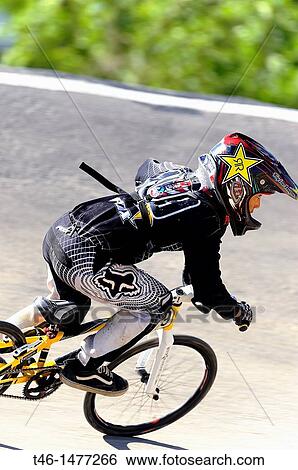 Stock Photograph - Spain Cup BMX circuit el soto de Mostoles Madrid where 300 runners participated in Spain, France, Portugal, Colombia, Chile, Bolivia etc.. Fotosearch