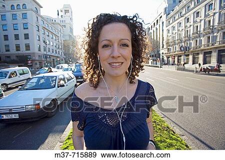 Spain. Madrid. Woman with Ipod. View Large Photo Image Stock Photo - Spain. Madrid. Woman with Ipod.. Fotosearch