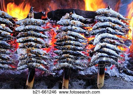 Spain. Malaga. Andalusia. Food:? Espeto de sardinas? (grilled sardines) at Restaurante Tintoreto. View Large Photo Image Stock Photograph - Spain. Malaga. Andalusia. Food:? Espeto de sardinas? (grilled sardines) at Restaurante Tintoreto.. Fotosearch
