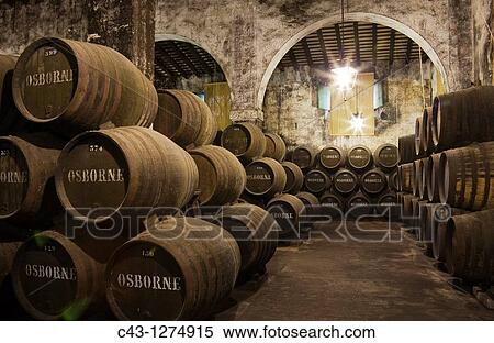 Spain - Stacked oak barrels in one of the cellars at the Bodega Osborne in the town of El Puerto de Santa Mar? a CBdiz province, Andaluc? a, Spain View Large Photo Image Stock Photography - Spain - Stacked oak barrels in one of the cellars at the Bodega Osborne in the town of El Puerto de Santa Mar? a CBdiz province, Andaluc? a, Spain. Fotosearch