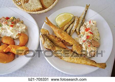Spain_Malaga_Andalusia_? Gambas en Gabardina? (dyp fried shrimps) and? Fritura Malaguea? _? boquerones? _? bacaladilla? _? salmonetes? ( fried fishes Malaga style) with? Ensaladilla rusa? (? Russian? salad)..food. View Large Photo Image Stock Image - Spain_Malaga_Andalusia_? Gambas en Gabardina? (dyp fried shrimps) and? Fritura Malaguea? _? boquerones? _? bacaladilla? _? salmonetes? ( fried fishes Malaga style) with? Ensaladilla rusa? (? Russian? salad)..food.. Fotosearch
