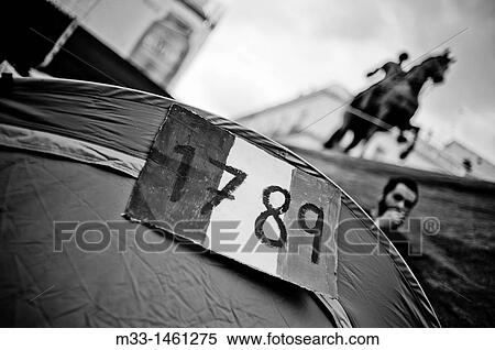 Spaniards flood Madrid's Puerta del Sol Square on regional and municipal pre-elections demonstrations View Large Photo Image Stock Photography - Spaniards flood Madrid's Puerta del Sol Square on regional and municipal pre-elections demonstrations. Fotosearch