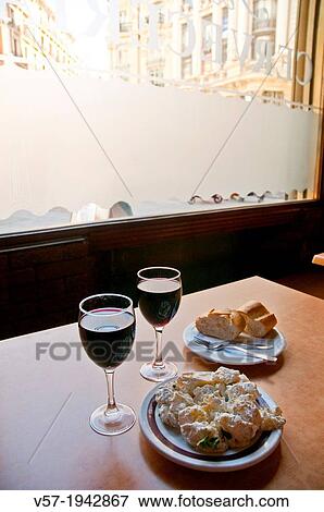 Spanish appetizer: alioli potatoes serving and two glasses of wine. Madrid, Spain. View Large Photo Image Stock Photo - Spanish appetizer: alioli potatoes serving and two glasses of wine. Madrid, Spain.. Fotosearch