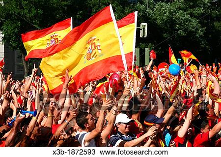 Spanish fans celebrate the arrival of the Spanish soccer team after their triumph in the European Football Championship 2012 Madrid, June 2, 2012 View Large Photo Image Stock Image - Spanish fans celebrate the arrival of the Spanish soccer team after their triumph in the European Football Championship 2012 Madrid, June 2, 2012. Fotosearch