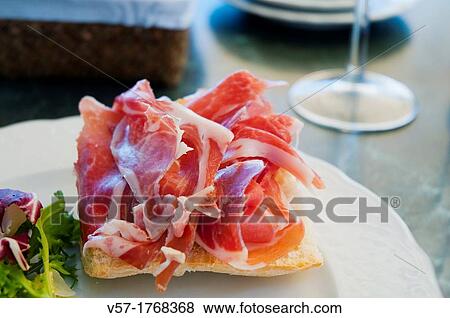 Spanish tapa: Iberian ham. Spain. View Large Photo Image Stock Photo - Spanish tapa: Iberian ham. Spain.. Fotosearch