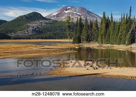 Sparks Lake and South Sister volcano, Willamette National Forest Oregon View Large Photo Image Stock Photo - Sparks Lake and South Sister volcano, Willamette National Forest Oregon. Fotosearch