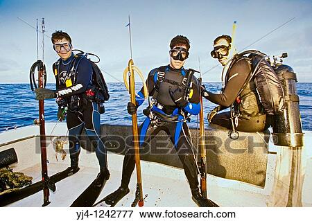 spearfishermen with powerheads or bang sticks, off Tampa, Florida, USA, Gulf of Mexico, Caribbean Sea, Atlantic Ocean Not to be used for anti-spearfishing campaign View Large Photo Image Stock Photo - spearfishermen with powerheads or bang sticks, off Tampa, Florida, USA, Gulf of Mexico, Caribbean Sea, Atlantic Ocean Not to be used for anti-spearfishing campaign. Fotosearch